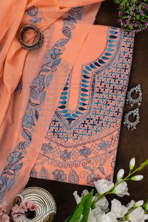 Adrika’s orange Kurta Set with Hand Embroidered Design