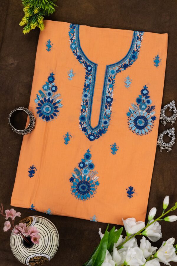 Adrika orange Kurta Set Featuring blue Hand Embroidery